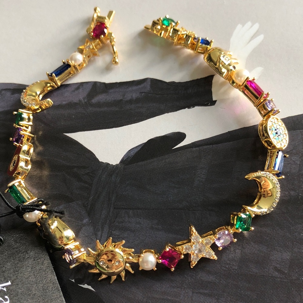 Authentic New with tag kate spade Gold Multicolor Celestial Charm Bracelet